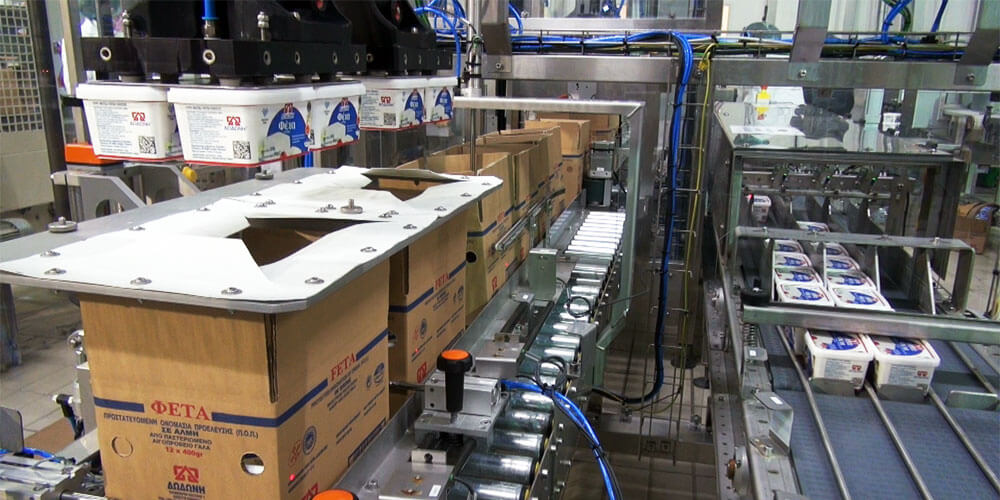 Automatic Case Packing System of Plastic Feta Containers at DODONI SA
